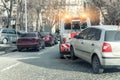 Car evacuation police service by tow truck machine on city downtown street center due parking traffic rules violation