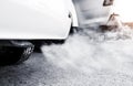 Car exhaust pipe comes out strongly of smoke Royalty Free Stock Photo