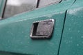 Car exterior door handle with rain drops Royalty Free Stock Photo