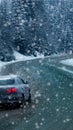 Car and falling snow in winter on forest road with much snow Royalty Free Stock Photo