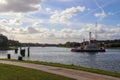 Car ferry boat crossing the Kiel canal in Germany on a sunny day.