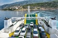 Car Ferry Boat with rows of cars is leaving the port. Royalty Free Stock Photo