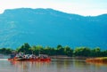 Car ferry crossing the river