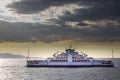 Car ferry, ferry boat on the sea, cloudy sky sunset on sea Royalty Free Stock Photo