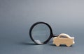 Car figure and magnifying glass. Search cars, buy or sell. Contacting the police to find the wanted stolen car. Car Breakdown