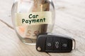 Car finance concept - money glass with word Car payment Royalty Free Stock Photo