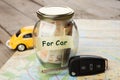 Car finance concept - money glass with word For car Royalty Free Stock Photo