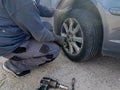 Car flat tire change replace on the road problem emergency Royalty Free Stock Photo