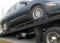 Car on a flatbed truck