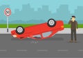 Car flips onto roof after colliding with vehicle. Upside down car crash on road. Shocked young male driver calls emergency.