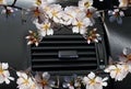 Car freshener aroma almond `s  flowers air-condition nentilator Royalty Free Stock Photo
