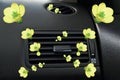 Car freshener aroma yellow flowers air-condition ventilator Royalty Free Stock Photo