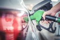 woman fueling gas in car at petrol station. Royalty Free Stock Photo