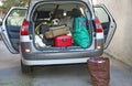 Car full of luggage before departure