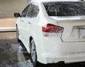 Car getting a wash with soap Royalty Free Stock Photo