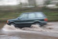 Car Going Through Flood Royalty Free Stock Photo