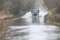 Car Going Through Flood Royalty Free Stock Photo