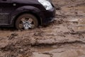 The car is stuck on a bad road in the mud Royalty Free Stock Photo