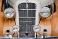 Car grill and headlamps of Plymouth PJ 1935 (retro vintage car)