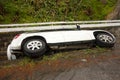 A car in the gutter after a party in the caribbean Royalty Free Stock Photo