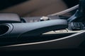 Interior modern car elements, close-up of handbrake and seat belt Royalty Free Stock Photo