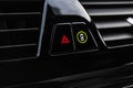 Car hazard warning flashers and emergency button with visible red triangle. Selective focus. Automotive part concept. Emergency st Royalty Free Stock Photo