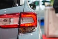 Car headlight with backlight. Exterior detail.Silver color car - image Royalty Free Stock Photo