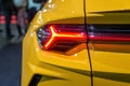 Car headlight with backlight. Exterior detail.Yellow color  luxury car - image Royalty Free Stock Photo