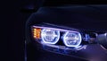 Car headlight with copy space macro view. Led or xenon lamp. Closeup of modern prestigious car. 3d illustration