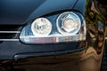 Car headlight with shallow depth of field.