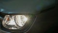 Car headlights and bumper at night Royalty Free Stock Photo