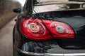 Car headlights. Clean headlights of black sports car.All LED adaptive headlights of