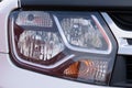 car headlights close-up, horizontal photo in daylight. Royalty Free Stock Photo