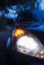 Car with headlights Royalty Free Stock Photo