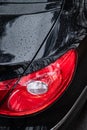 Car headlights. Exterior closeup detail.Car detailing series: Clean headlights of black sports car.All LED adaptive headlights of