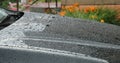 car hood with water drops after rain Royalty Free Stock Photo