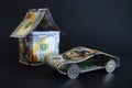 Car and house made of money. Royalty Free Stock Photo