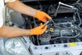 Car ignition or spark coil replacement. Repairing of vehicle. Royalty Free Stock Photo