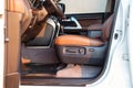 Car inside driver place. Brown interior of prestige modern car. Front seats with steering wheel dashboard. After washing and