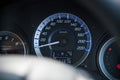 Car instrument panel dashboard automobile control illuminated panel speed display, close up and shallow depth of field Royalty Free Stock Photo