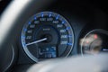 Car instrument panel dashboard automobile control illuminated panel speed display, close up and shallow depth of field Royalty Free Stock Photo