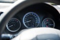 Car instrument panel dashboard automobile control illuminated panel speed display, close up and shallow depth of field Royalty Free Stock Photo