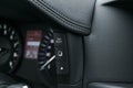 Car instrument panel, dashboard closeup with visible speedometer and trip buttons. Modern car interior details. Royalty Free Stock Photo