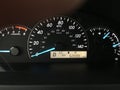 Car instrument panel 50000 mile. Illuminated in the night. Royalty Free Stock Photo