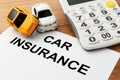 Car insurance concept with calculator Royalty Free Stock Photo