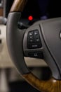 Car interior. Buttons on steering wheel.