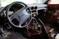 Car interior with disassembled electrics in the garage.