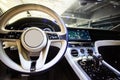 Car interior luxury. Interior of prestige modern car. Dashboard and steering wheel. Focus on steering wheel.