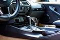 Car interior. Modern car speedometer and dashboard. Luxurious car instrument cluster.