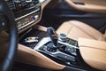 Car Interior: Modern Center Console with dials, buttons and gear knob